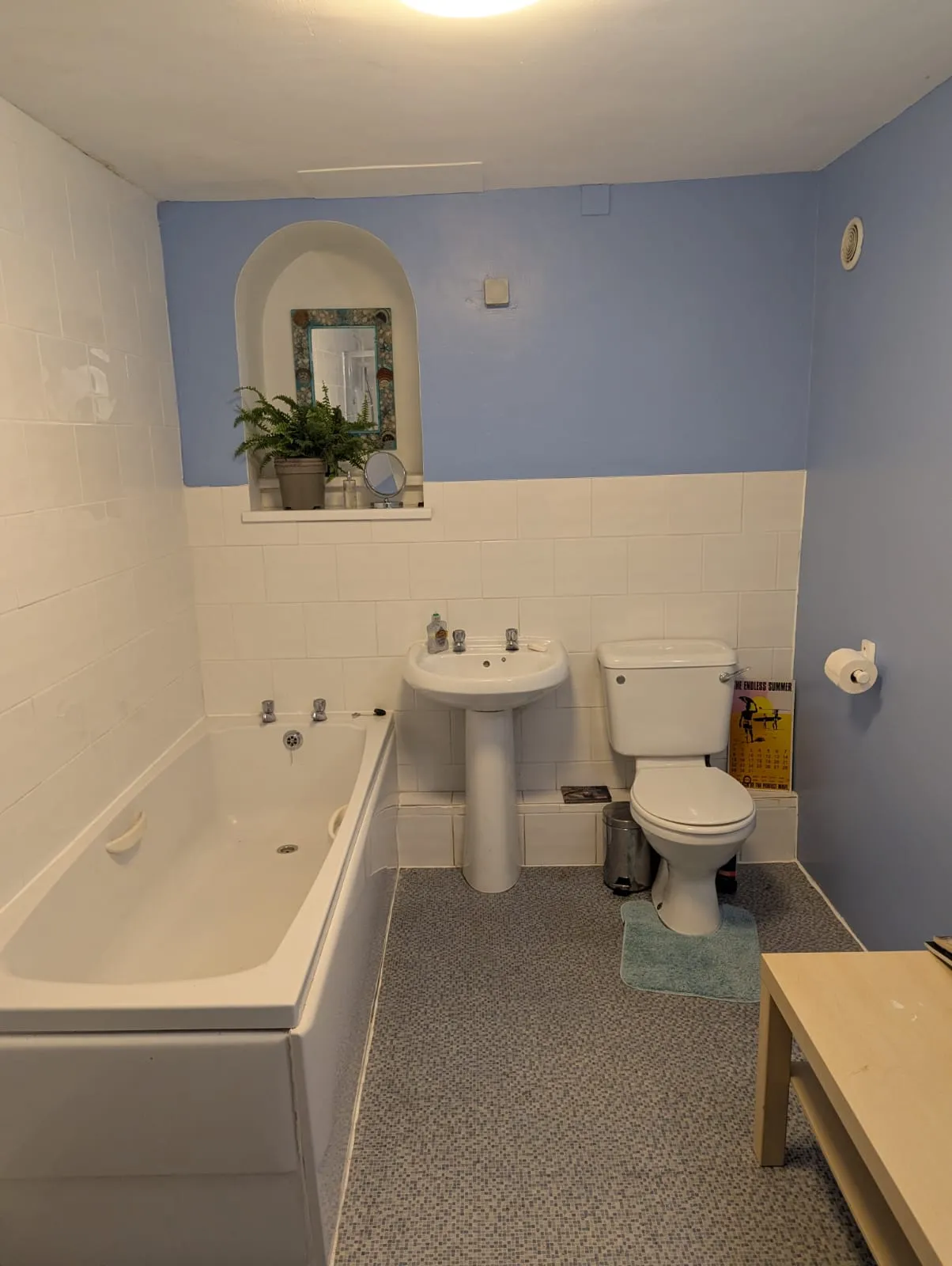 Bathroom with shower, sink and toilet