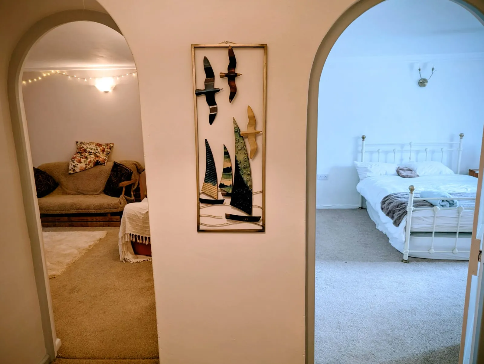 View from hallway into the sitting room and double bedroom